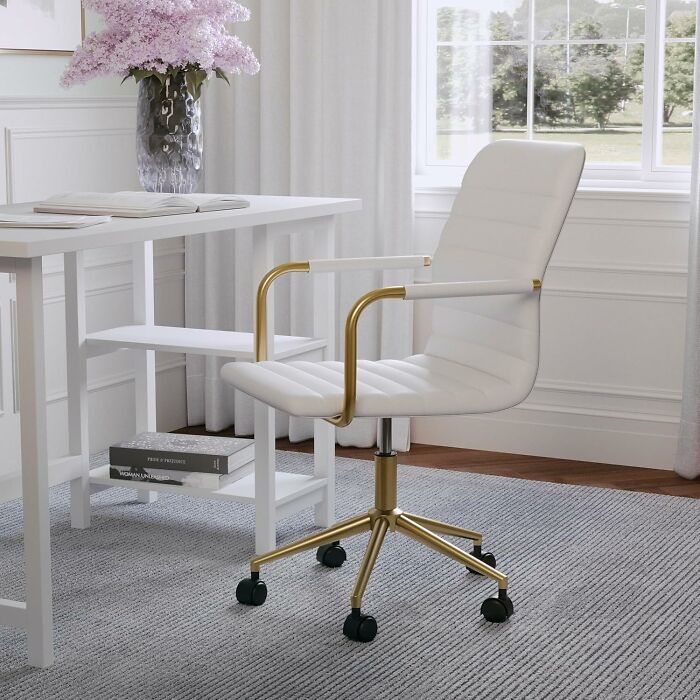 Bring A Touch Of Martha's Refined Style To Your Home Office With Her Chic White Pleather Desk Chair With Brass Detailing