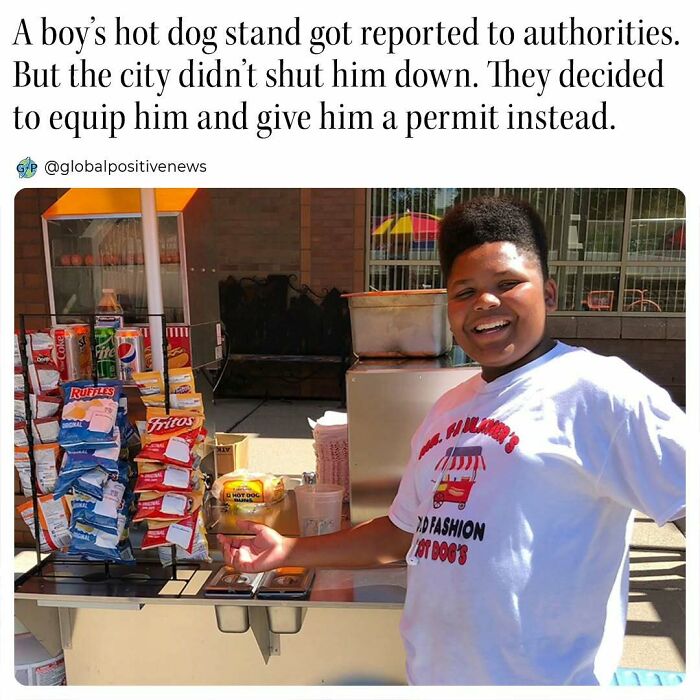 Boy smiling at his hot dog stand with snacks, showcasing uplifting story of support and success.