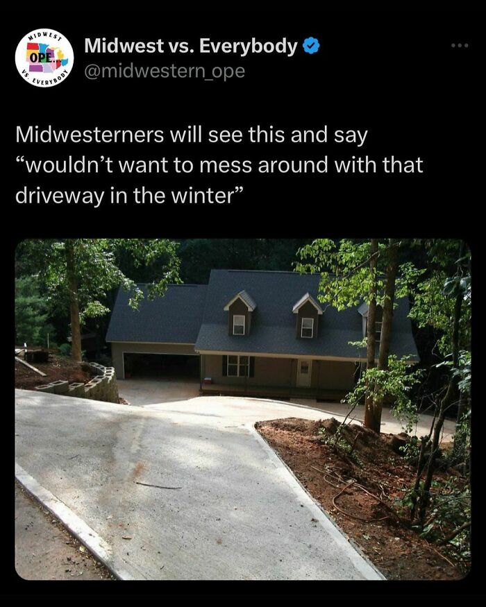 Midwest culture showcased with a steep driveway leading to a house, surrounded by trees, highlighting winter challenges.