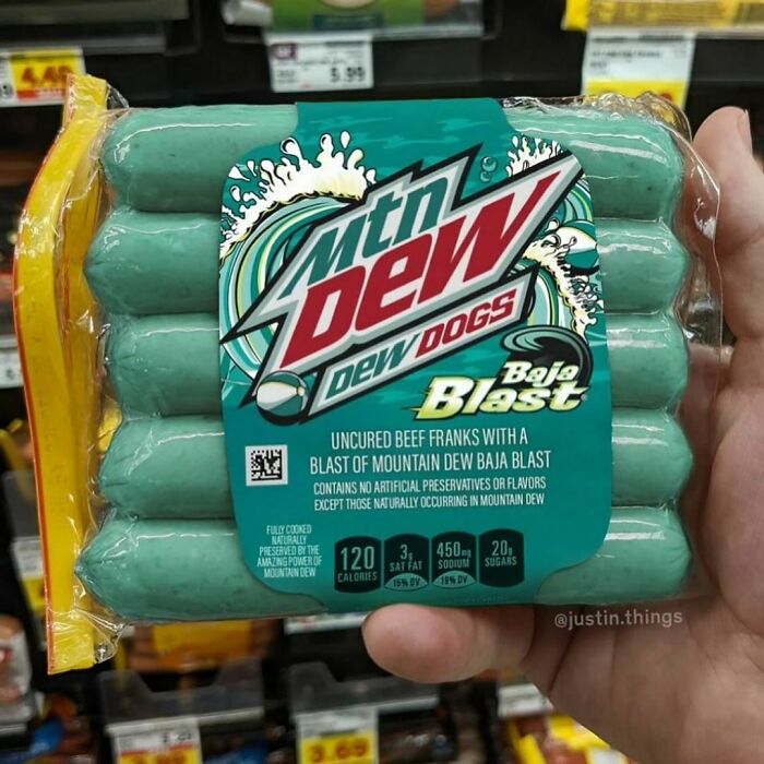 Package of Dew Dogs flavored with Mountain Dew, held in a store.