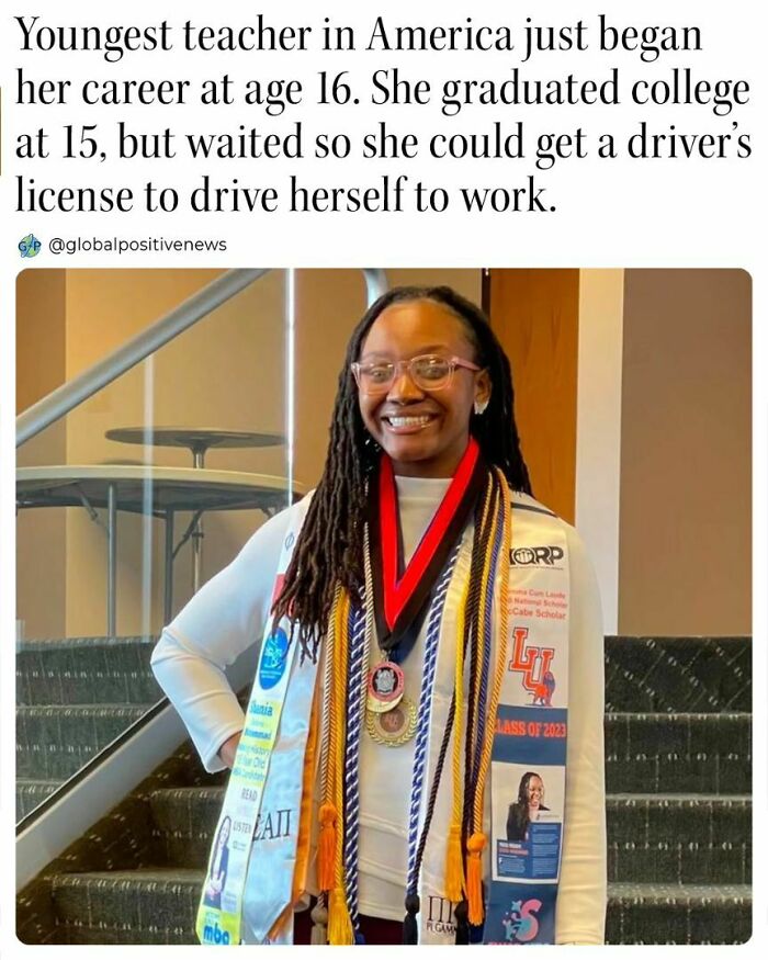 Young American teacher at 16 with academic medals, smiling proudly near stairs.