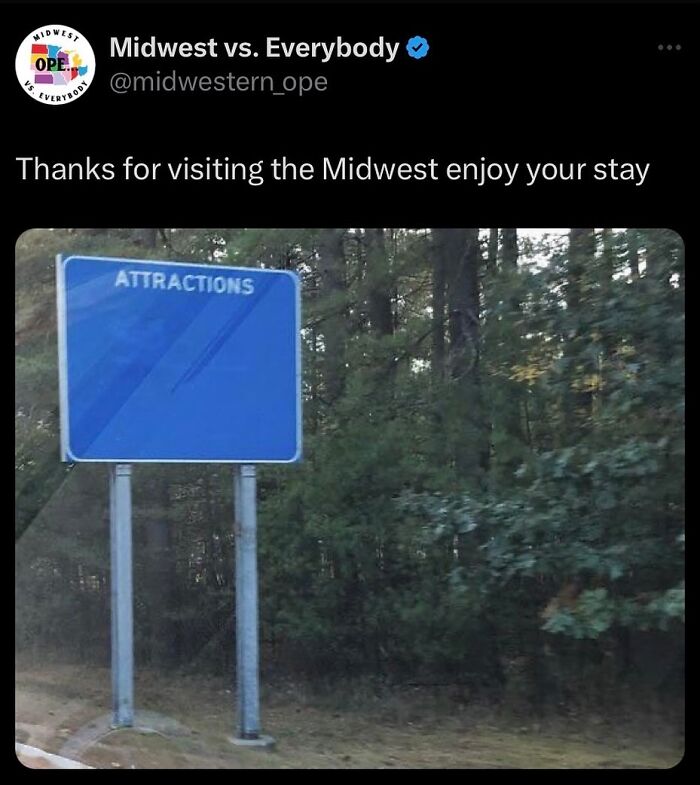 Midwest sign labeled "Attractions" in a wooded area, humorously capturing regional quirks.