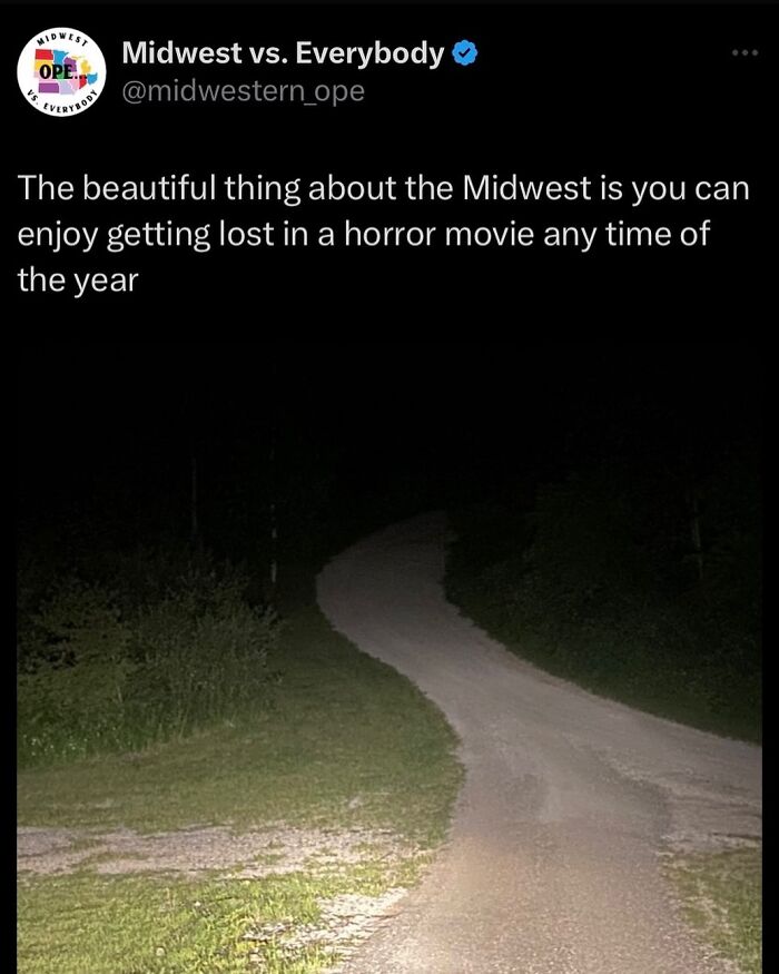 Dark Midwest road at night, resembling a scene from a horror movie.