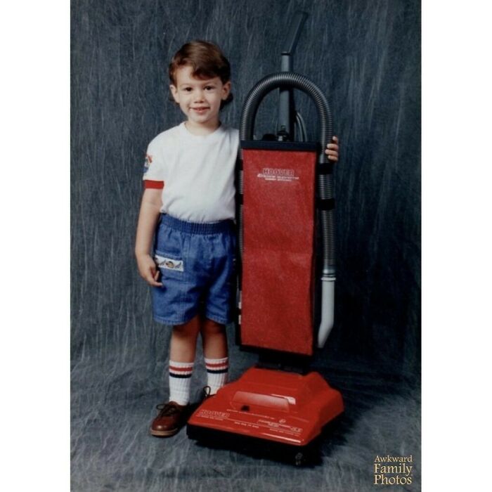 “As A Child, My Boyfriend Loved Appliances And In His Eyes, All Other Appliances Paled In Comparison To The Vacuum Cleaner. When He Was Around Five, His Mom Took Him To A Photography Studio To Get His Portrait Taken. He Asked The Photographers If They Had Any Vacuums He Could Take A Picture With. They Found One In A Broom Closet And Brought It Out For Him… The Rest Is History.”⁠