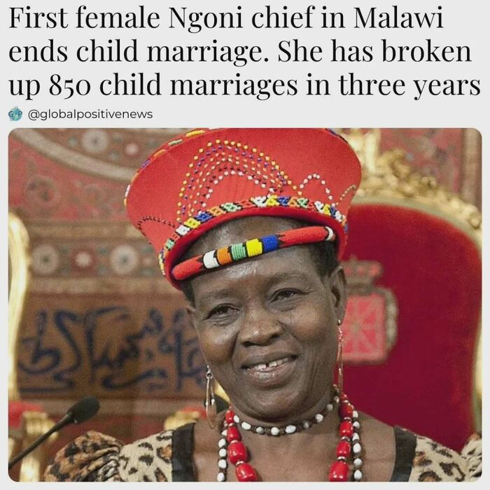 Malawi's first female Ngoni chief in traditional attire, known for ending child marriages, smiling proudly.