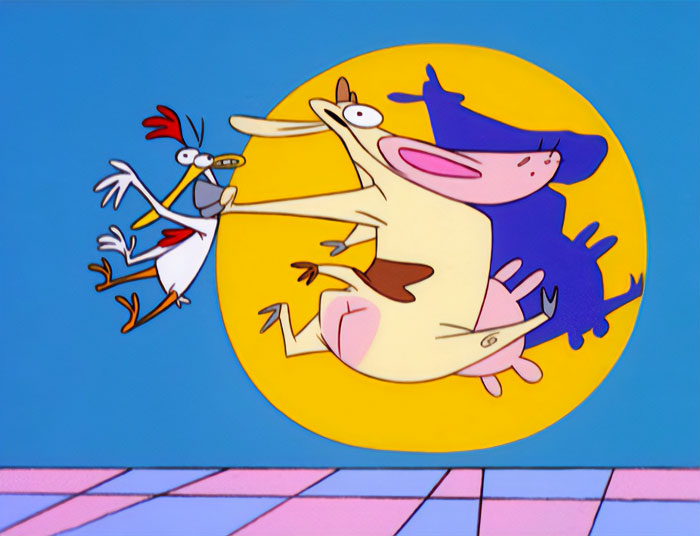 A fat cartoon character, Cow, joyfully leaps while holding Chicken against a bright yellow background, creating a playful and exaggerated scene.