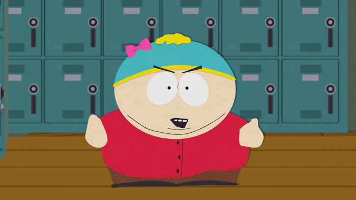 A fat cartoon character, Eric Cartman, wearing a red shirt, blue hat with a yellow accent, and a pink bow, stands in front of school lockers.