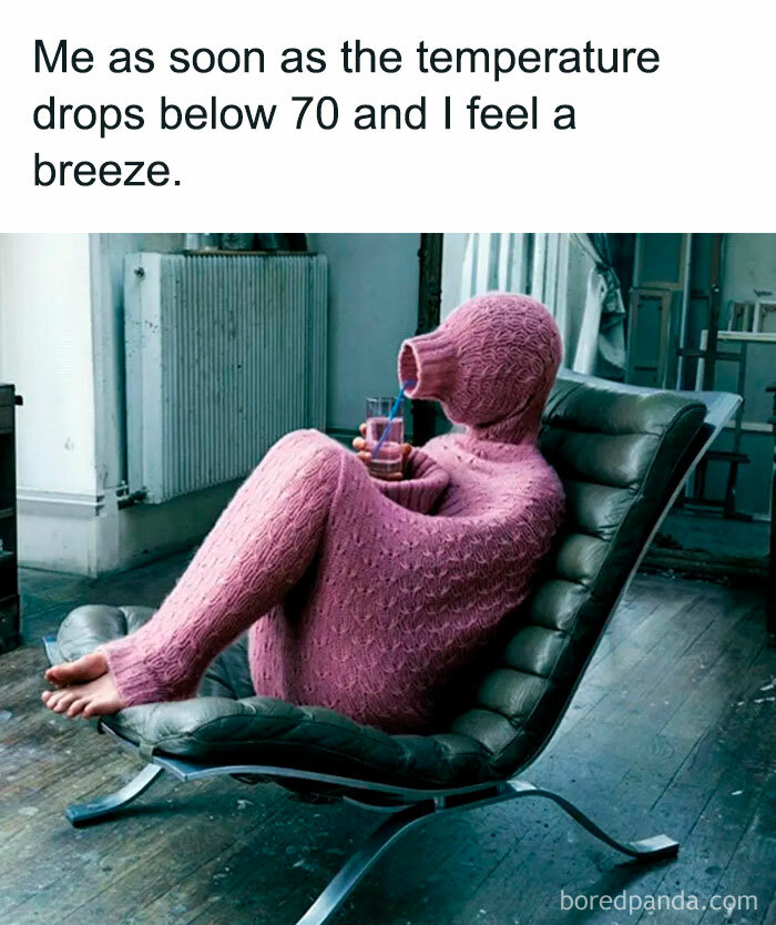 A November meme with a person in full-body pink knit suit with a drink, illustrating a humorous take on winter preparedness.