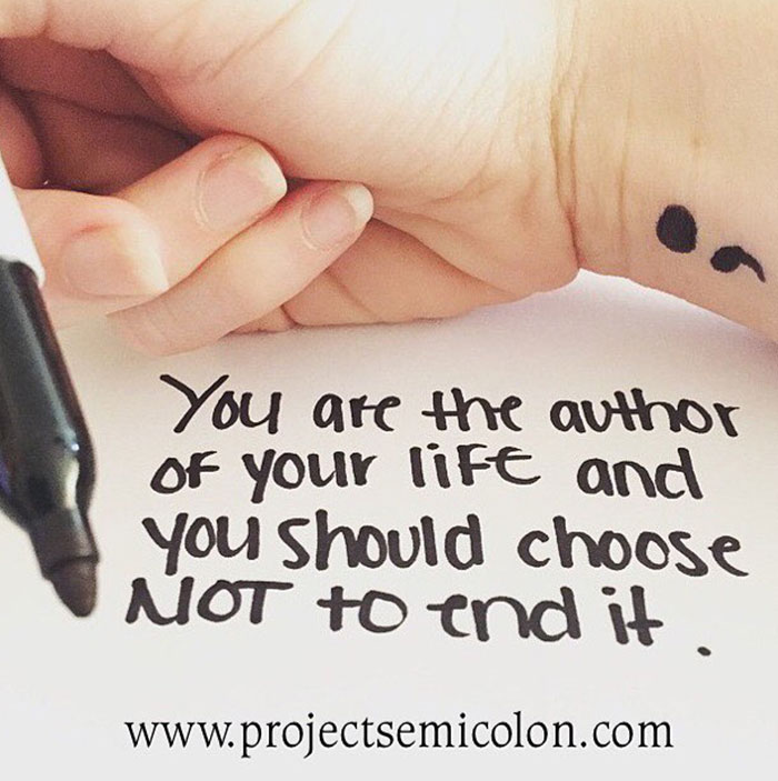 A semicolon tattoo on the wrist with handwritten text reading, "You are the author of your life and you should choose NOT to end it," promoting Project Semicolon.