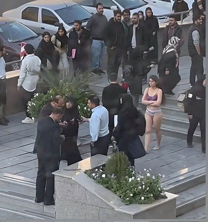 "I'm Horrified": Student's Violent Arrest For Publicly Stripping To Protest Hijab Law Goes Viral