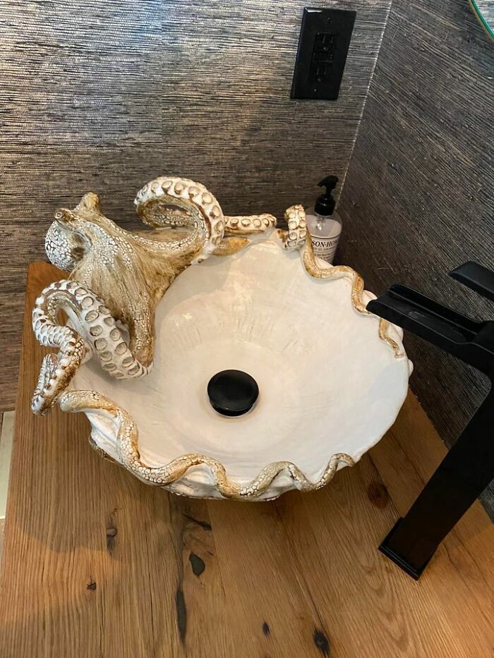 This Sink At A House I Clean. Super Cool Looking But Terrible To Clean. I Have To Get A Brush And Brush It Also Their Walls Which Are In The Bathroom Are Fabric Thats Super Hard To Wipe Clean