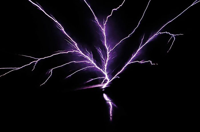 Purple lightning bolts branching out against a dark background, resembling chaotic energy. Referencing the Elmo fire meme’s intense vibe.