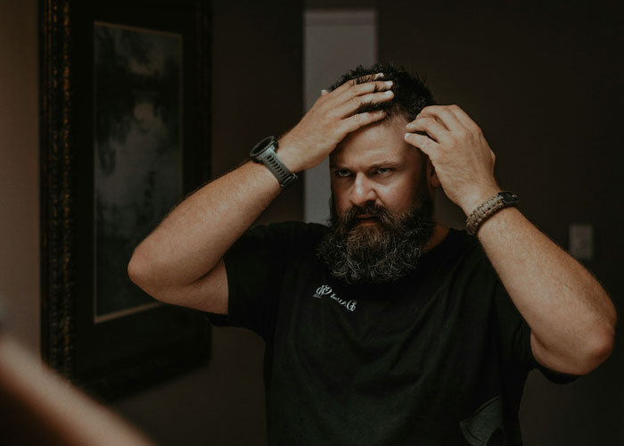 Man’s Anger About Son’s Hair Stops After Discovering His Own High School Photo With Similar Style