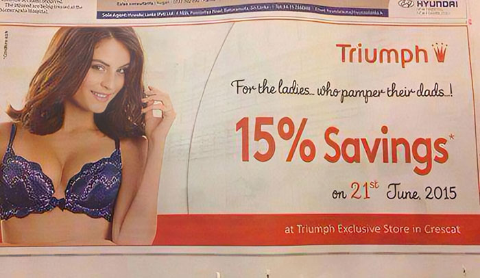 Advertisement with funny ad fails message: "15% Savings for ladies who pamper their dads" featuring a woman in lingerie.