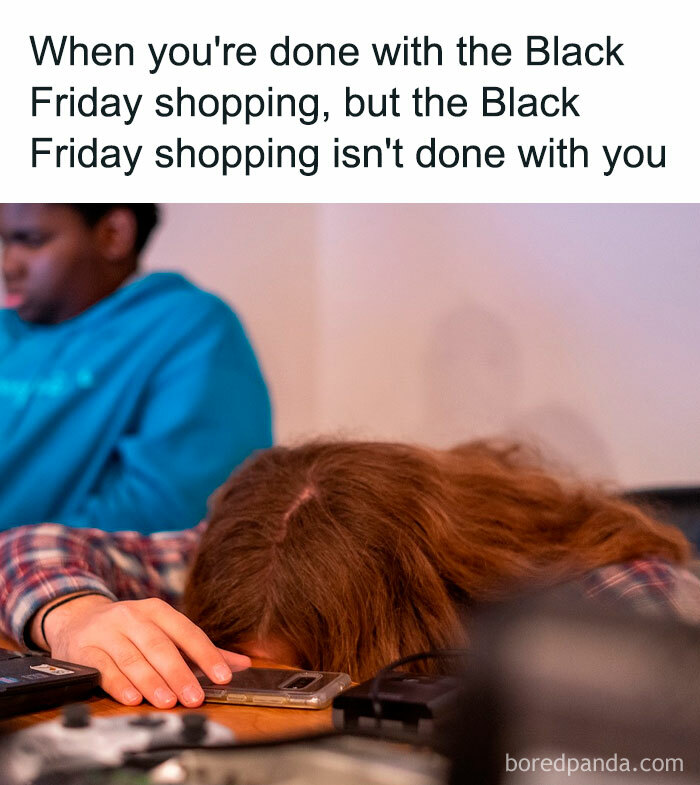 Person exhausted after Black Friday shopping, head on table with phone in hand. Funny Black Friday meme in background.