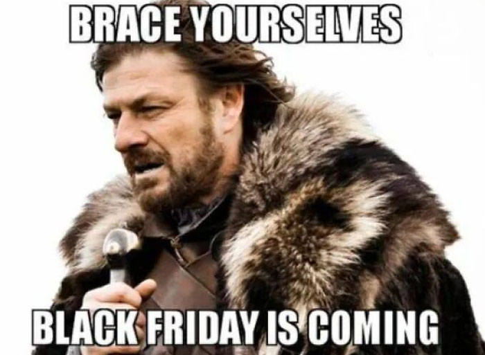 Man in fur coat with text: "Brace yourselves, Black Friday is coming." Funny Black Friday meme.