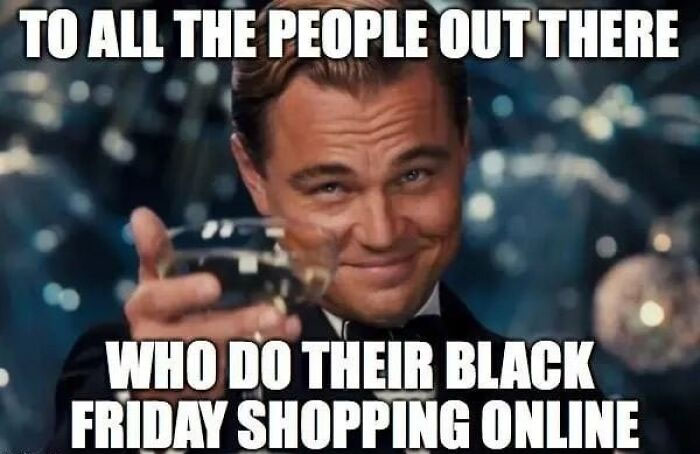 Man raising a glass with a playful smile, captioned about Black Friday shopping online.