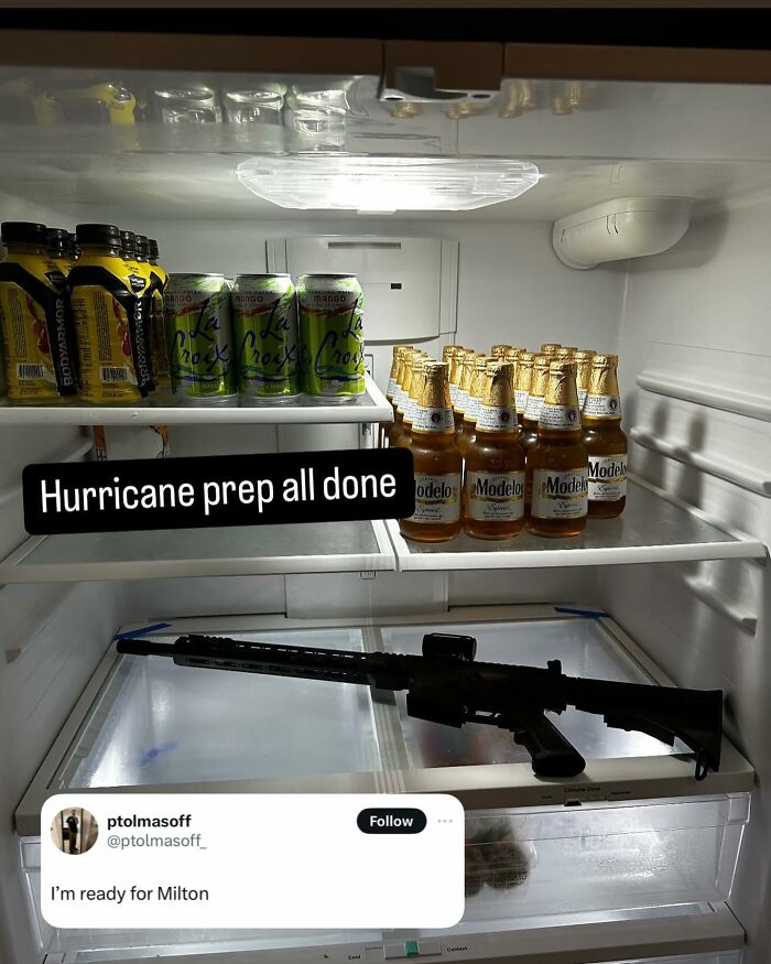 Dude fridge with drinks and a rifle, featuring Modelo beer and LaCroix cans, captioned "Hurricane prep all done."