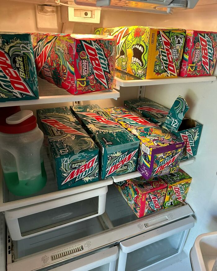 Fridge packed with various Mountain Dew boxes, showcasing a collection of "dude fridges" beverages.