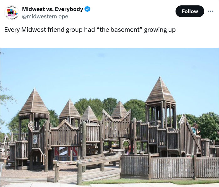 Wooden playground resembling a castle, showcasing Midwest charm in a park setting.