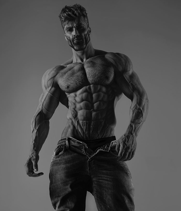 A grayscale photo of a muscular man with chiseled abs and a confident pose, often associated with the Giga Chad meme aesthetic.