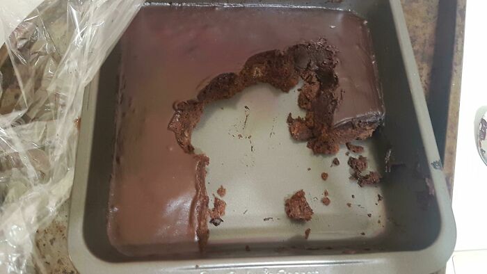 Cake with uneven piece missing, showing an example of frustrating boyfriend behavior.