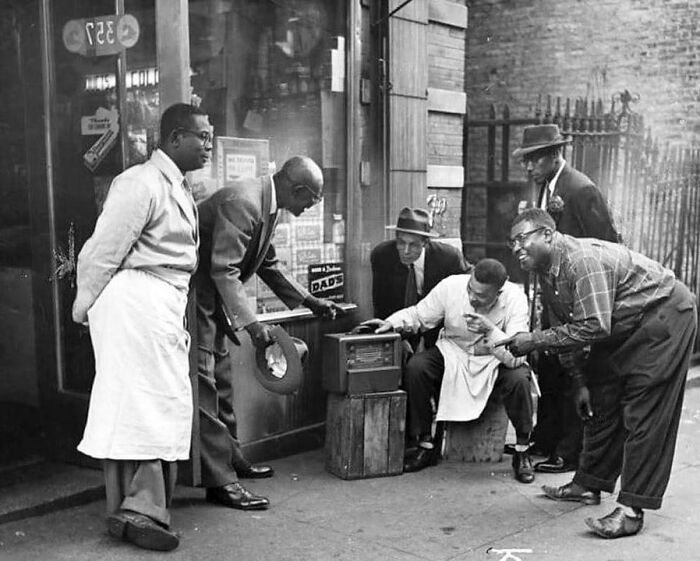 Men In Harlem Gather In Front Of A Shop To Listen To The Radio, 1940