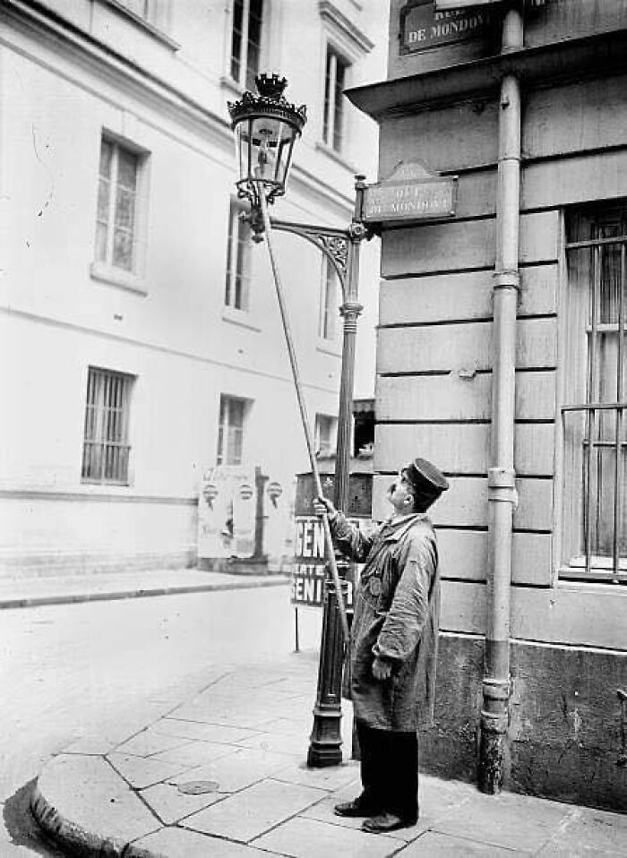 Gentleman Lighting A Street Lamp In Paris, 1905