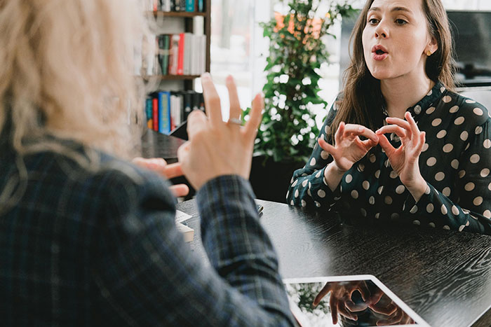 “She Literally Dropped Her Bag”: Coworker Reveals FSL Skills, Stuns Deaf Friend Into Tears