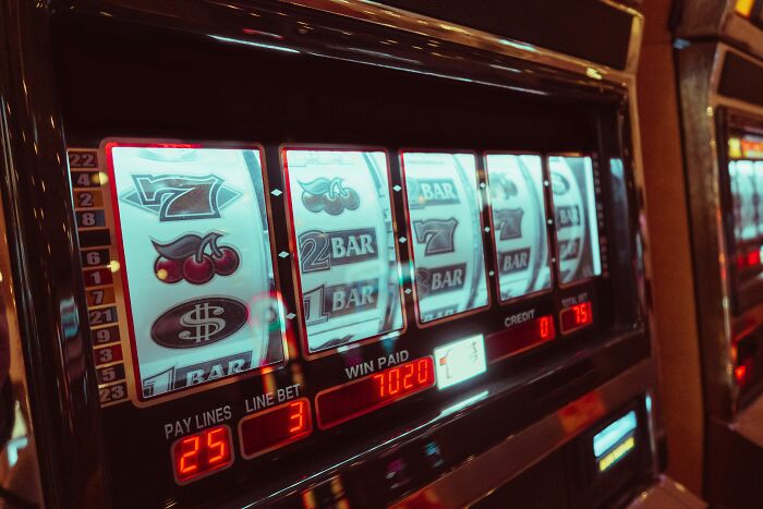 Slot machine showing a winning spin with various symbols, relevant to sudden relationship realizations.