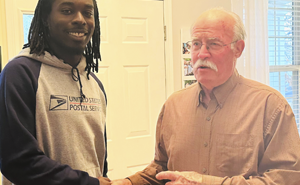 Mailman Saves Stranger’s Life, Their Families End Up Celebrating Thanksgiving Together