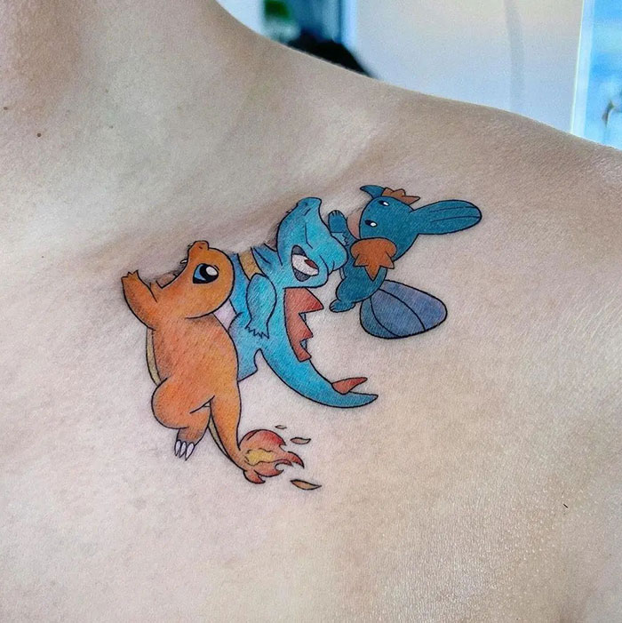 Colorful tattoo idea for women with cartoon characters on the shoulder.