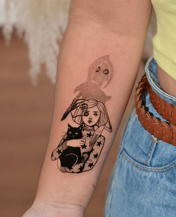 A tattoo idea for women with a tattoo of a girl holding a cat on a woman's arm, combining daring and subtle artistry.