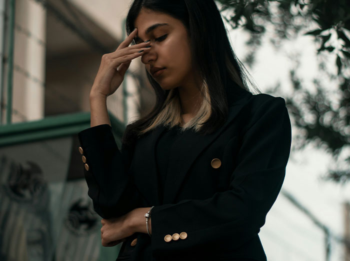 Woman Confused Why Brother Is Angry She Wore A White Blouse Under Her Black Suit To His Wedding