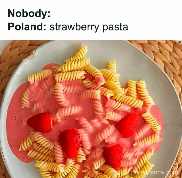 Strawberry pasta meme highlighting Polish food humor with spiral noodles and strawberries on a plate.