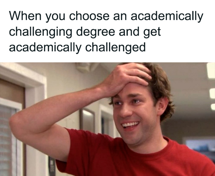 A man in a red shirt smiling with hand on forehead, reacting humorously to an academically challenging situation. Science memes.