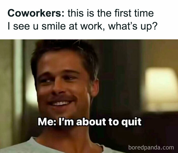 Smiling man with humorous work meme text about quitting, ideal for sharing with colleagues.