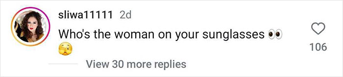 Comment on Hugh Jackman's post mentioning a mysterious woman seen in his sunglasses.