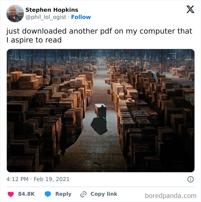 Relatable mental health meme with stacks of boxes and a lone figure, captioned about downloading PDFs to read.