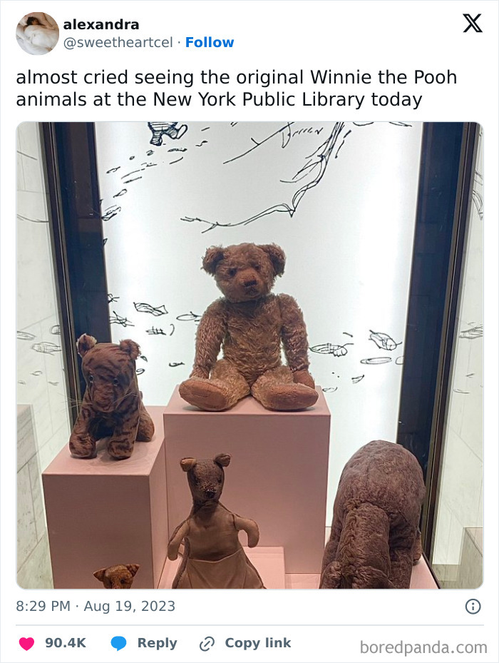 Original Winnie the Pooh toys displayed at New York Public Library, reflecting memes and culture nostalgia.