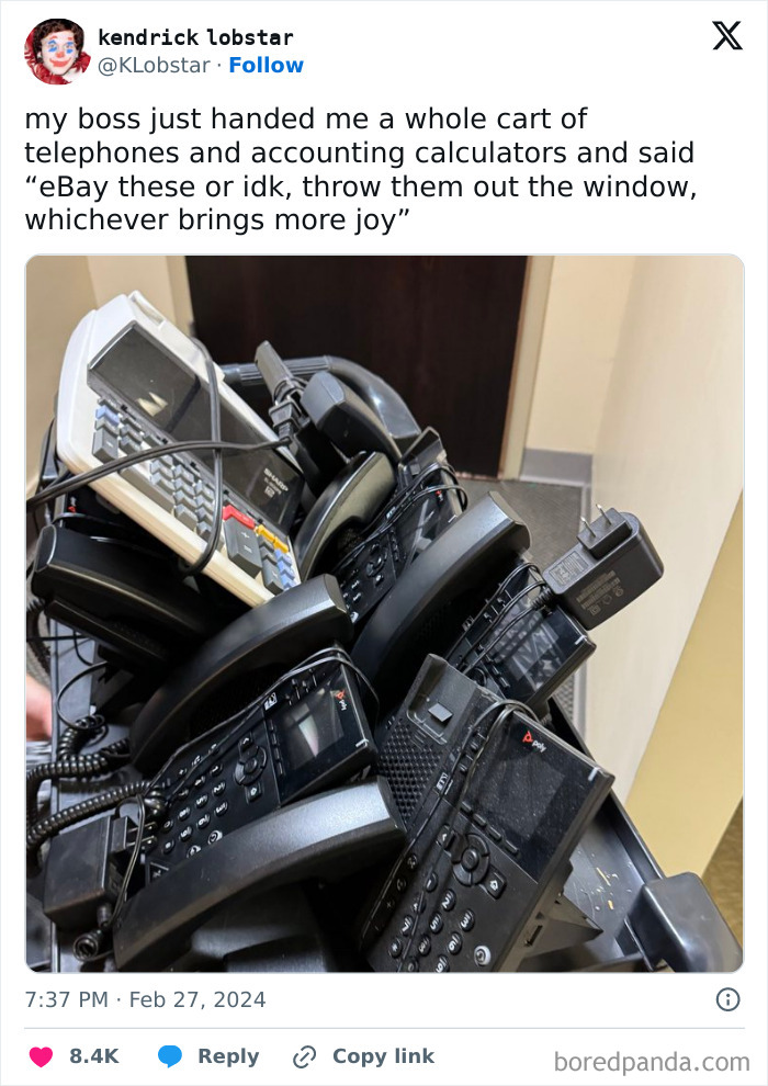 Cart filled with old telephones and calculators, showcasing a humorous boss's request.