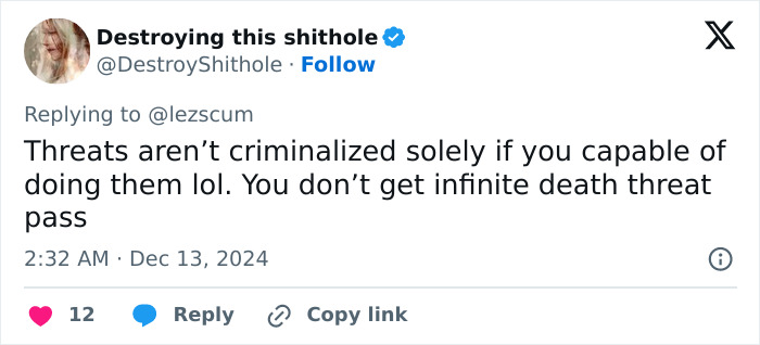 Tweet screenshot discussing threat criminalization by a user.
