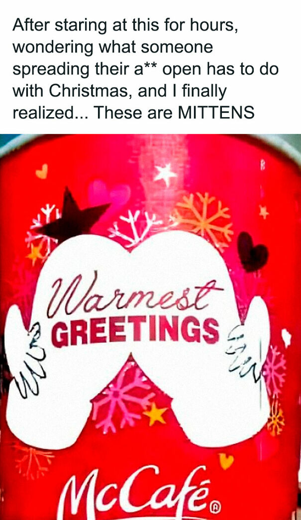 Weird and absurd sign: McCafé cup with "Warmest Greetings" mittens design causing confusion at first glance.