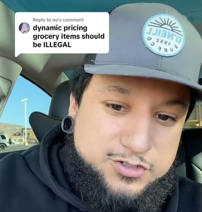 Man discusses dynamic pricing in retail, questioning legality, wearing a cap in a car setting.