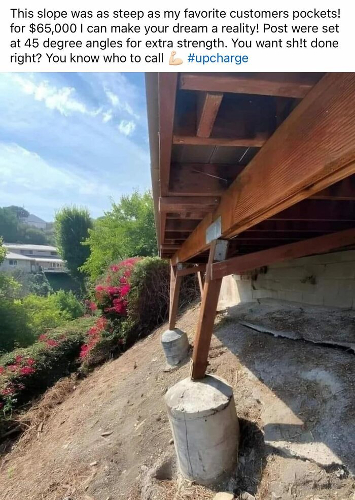 Sloped backyard with wooden beams poorly supporting a structure, illustrating funny cheap construction fails.