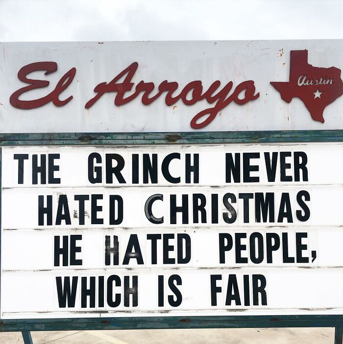 El Arroyo sign with witty message about the Grinch disliking people, not Christmas.