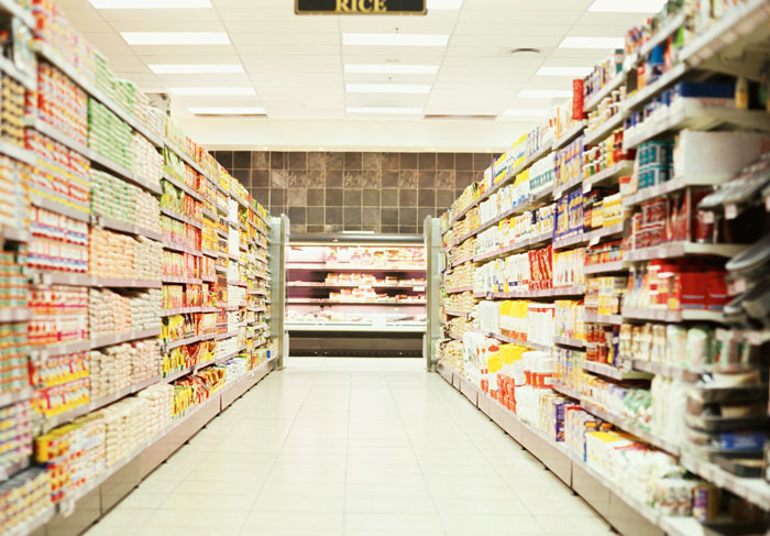 Grocery store aisle filled with products, representing reasons for being fired.