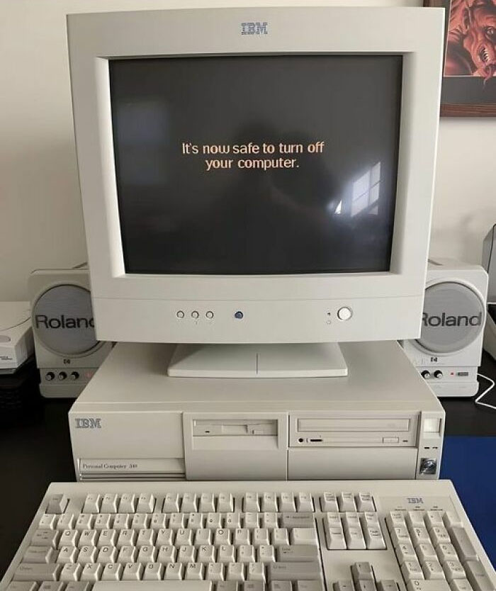 Retro IBM computer with text "It's now safe to turn off your computer" on the screen, showcasing a nostalgic IT meme.