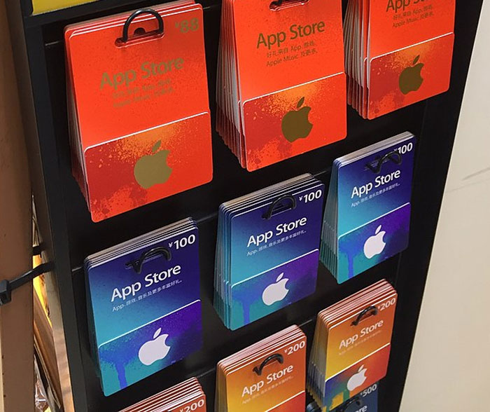 App Store gift cards on display, part of a story on being fired for unexpected incidents.