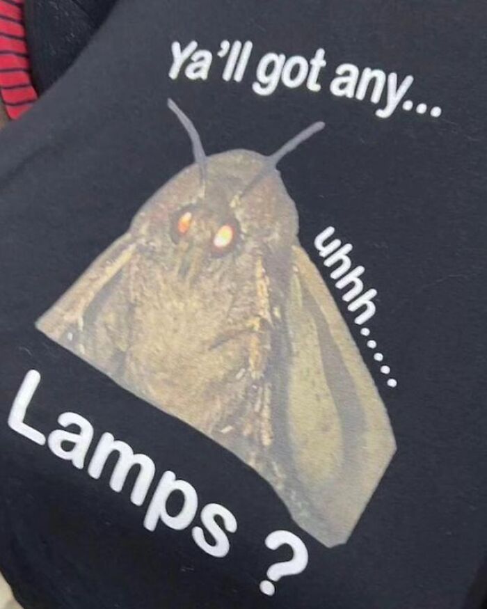 Weird shirt with a moth and humorous text about lamps.